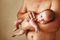 Closeup portrait of young father holding his newborn baby. Fathers day holiday, love, care concept. Royalty Free Stock Photo