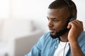 Closeup Portrait Of Young Handsome African American Man In Headset Royalty Free Stock Photo