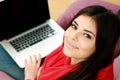 Closeup portrait of a young happy woman with laptop Royalty Free Stock Photo