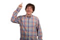 Closeup portrait of young man in checkered shirt pointing finger. Royalty Free Stock Photo