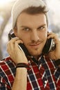 Closeup portrait of young man with headphones Royalty Free Stock Photo