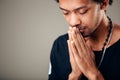 Praying african american man hoping for better. Asking God for good luck Royalty Free Stock Photo