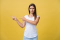 Closeup portrait of young pretty unhappy, serious woman pointing at someone as if to say you did something wrong, bad Royalty Free Stock Photo