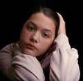 Closeup portrait of a young teen girl. Studio shot.