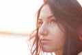 Closeup portrait of young woman in bright light of sunset. Summer Royalty Free Stock Photo