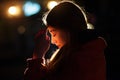 Closeup portrait of a young woman praying Royalty Free Stock Photo