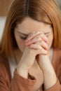 closeup portrait young woman praying Royalty Free Stock Photo