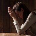 Closeup portrait of a young woman praying Royalty Free Stock Photo