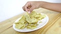 Closeup Potato Chip on White Plate.