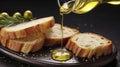 Closeup, Pouring of olive oil onto fresh bread on dark background