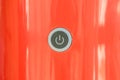 Closeup power button at red coffee machine background Royalty Free Stock Photo