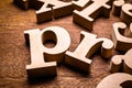 PR Public Relations Wood Letters Royalty Free Stock Photo