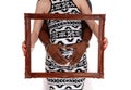 Closeup of pregnant couple with picture frame. Royalty Free Stock Photo