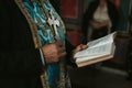 Closeup of a priest reading bible in a church Royalty Free Stock Photo