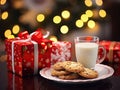 Closeup professional color grading photography of Christmas cookies, glass of milk, and gift boxes with blurred