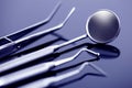 Closeup of professional dental tools on shiny table Royalty Free Stock Photo