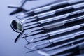 Closeup of professional dental tools on shiny table Royalty Free Stock Photo