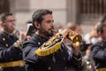 Closeup of professional musicians playing trumpets on the street during Holy Week in Spain