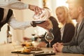 Sommelier Pouring Wine Closeup