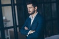 Closeup profile photo of trendy handsome business person guy standing in modern stylish interior apartments office