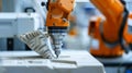 Closeup of a programmed robotic arm precisely carving out miniature details in a block of raw material using advanced