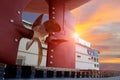 Closeup propeller brass in floating dock with sunset. Royalty Free Stock Photo