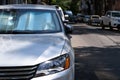 Protective reflective surface under windshield of car on hot day, heated by sun's rays inside car