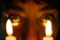 closeup of psychics eyes with candlelight reflected