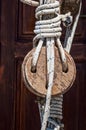 Closeup of pulley and rope on old sailing ship Royalty Free Stock Photo