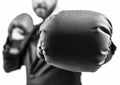 closeup punch of cropped businessman in boxing gloves ready for corporate business battle, knockout. Royalty Free Stock Photo