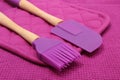 Closeup of purple silicone kitchen accessories