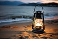 closeup of a quaint lantern illuminating a beach campsite