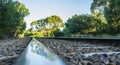 Closeup of rail track with tree reflection. Royalty Free Stock Photo