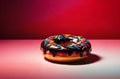 Closeup Rainbow Donut isolated. Break time with Doughnut side view on red background