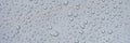 Closeup of raindrops on gray window glass texture background Royalty Free Stock Photo