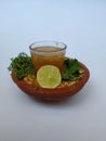 Ram Navami Hindu Festival Food Musk Melon Cool drink, Hesaru Bele with Lemon in a Sand Bowl on White Background