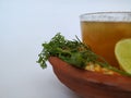 Ram Navami Hindu Festival Food Musk Melon Cool drink, Hesaru Bele with Lemon in a Sand Bowl on White Background