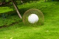 Closeup of rattan white floor lamp on the grass in the park Royalty Free Stock Photo