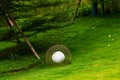 Closeup of rattan white floor lamp on the grass in the park Royalty Free Stock Photo