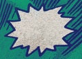 Closeup of real vintage comic book page with empty white speech bubble on a background texture of blue green printing dots Royalty Free Stock Photo