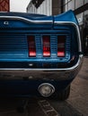 Closeup of the rear taillight of a blue 67 Mustang Royalty Free Stock Photo