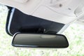 Closeup of rear view mirror in modern car interior Royalty Free Stock Photo