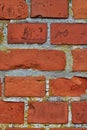 Closeup of red brick wall and copy space on the exterior of a home, house, or city building. Texture, detail of rough Royalty Free Stock Photo