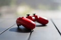 Closeup of a red controller on a gray metal table Royalty Free Stock Photo