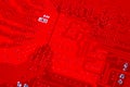 Closeup of red electronic motherboard circuit with processor Royalty Free Stock Photo