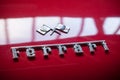 Closeup of red ferrari 250 GT logo Royalty Free Stock Photo