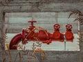 Closeup of a red fire hydrant with multiple valves