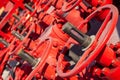 Closeup of a red industrial oil pipeline valves Royalty Free Stock Photo