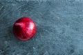 Closeup on red onion on stone substrate