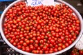 Closeup of red ripe cherry tomatoes at farmers market place Royalty Free Stock Photo